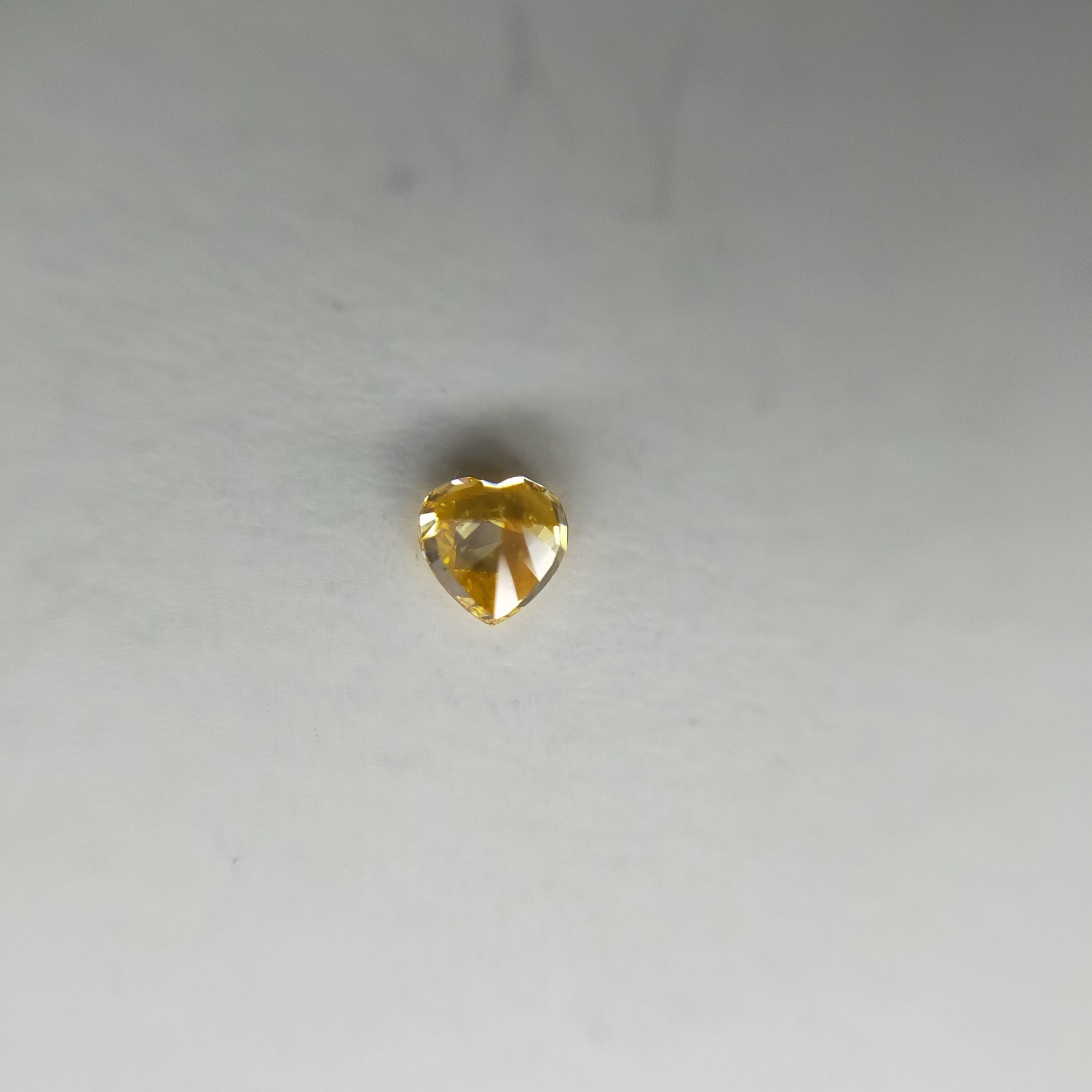 ダイヤモンド 0.092ct /Fancy Vivid Yellow "Orange"