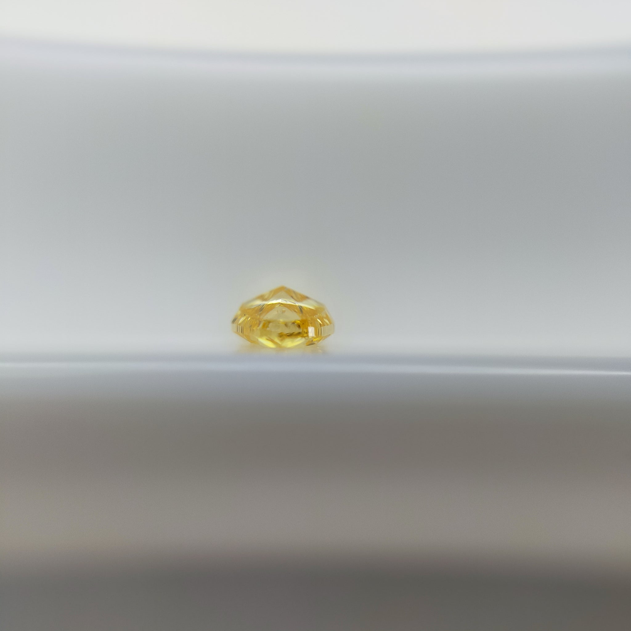 ダイヤモンド 0.092ct /Fancy Vivid Yellow "Orange"