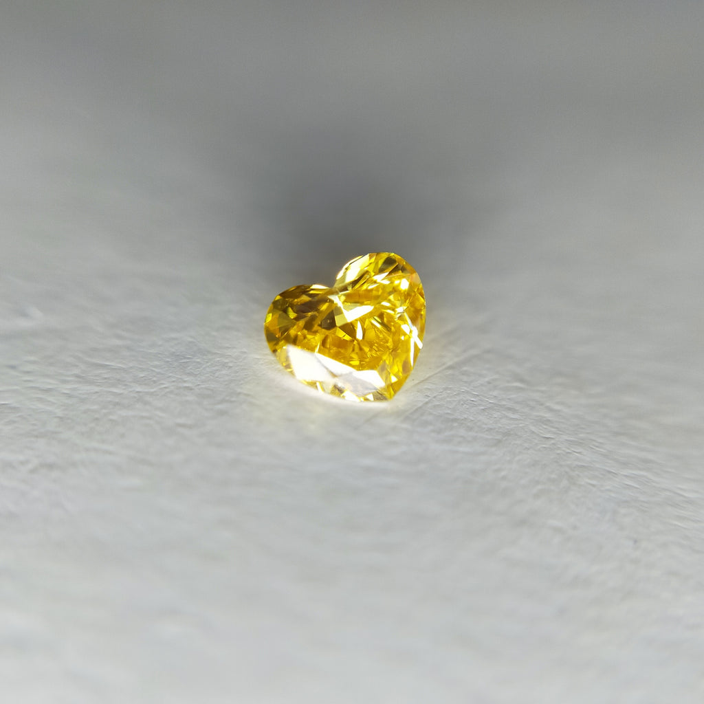 ダイヤモンド 0.142ct /Fancy Vivid Orangy Yellow