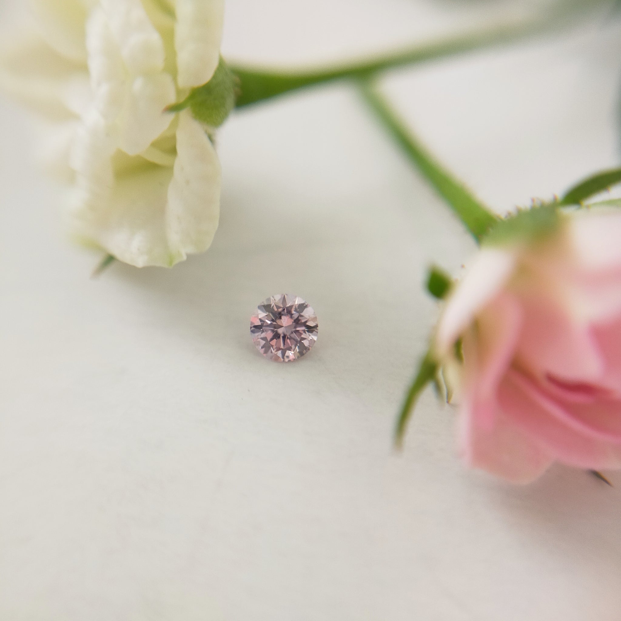 ダイヤモンド 0.061ct /Fancy Purplish Pink